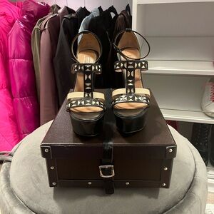 ALAÏA  LASER CUT WEDGE HEELS